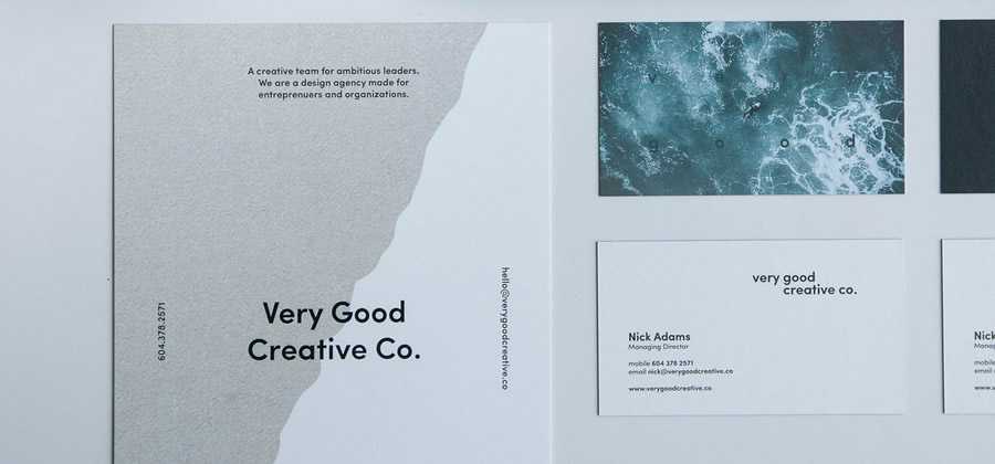 selection of branded designer business cards documents